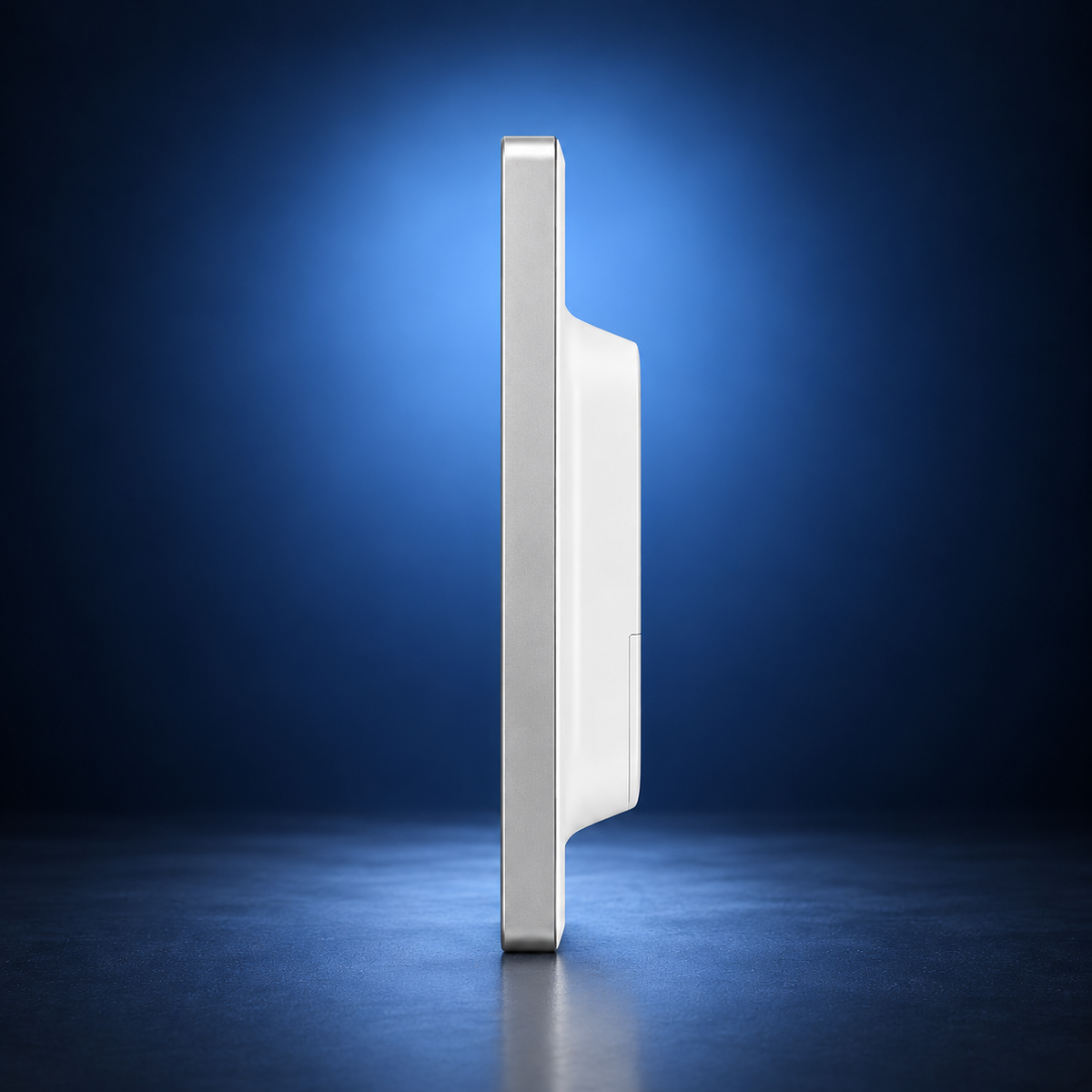 LG-32HL714S-W surgical monitor, side view, white housing against a dark blue studio background.