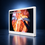 LG-32HR734S-W surgical monitor, angled front right view, white housing against a dark blue studio background.