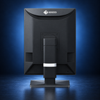 EIZO RadiForce MX217 monitor, rear view showing the black housing and stand on a dark blue studio background.