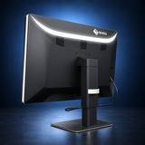 EIZO RadiForce RX1270 monitor, angled rear view showing the black housing and stand on a dark blue studio background.
